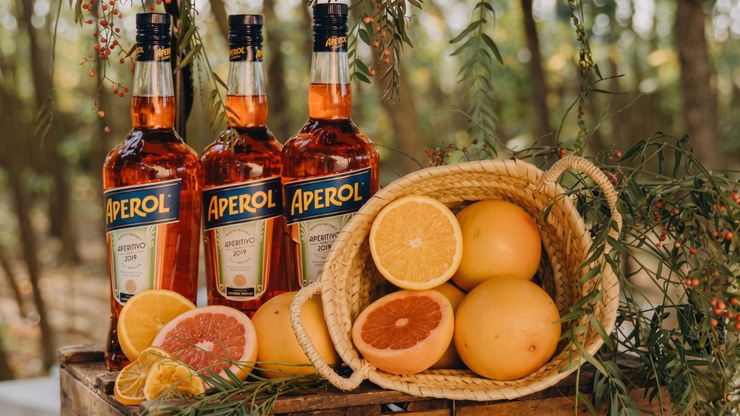 Rincón de Aperol para bodas en Madrid con decoración cítrica